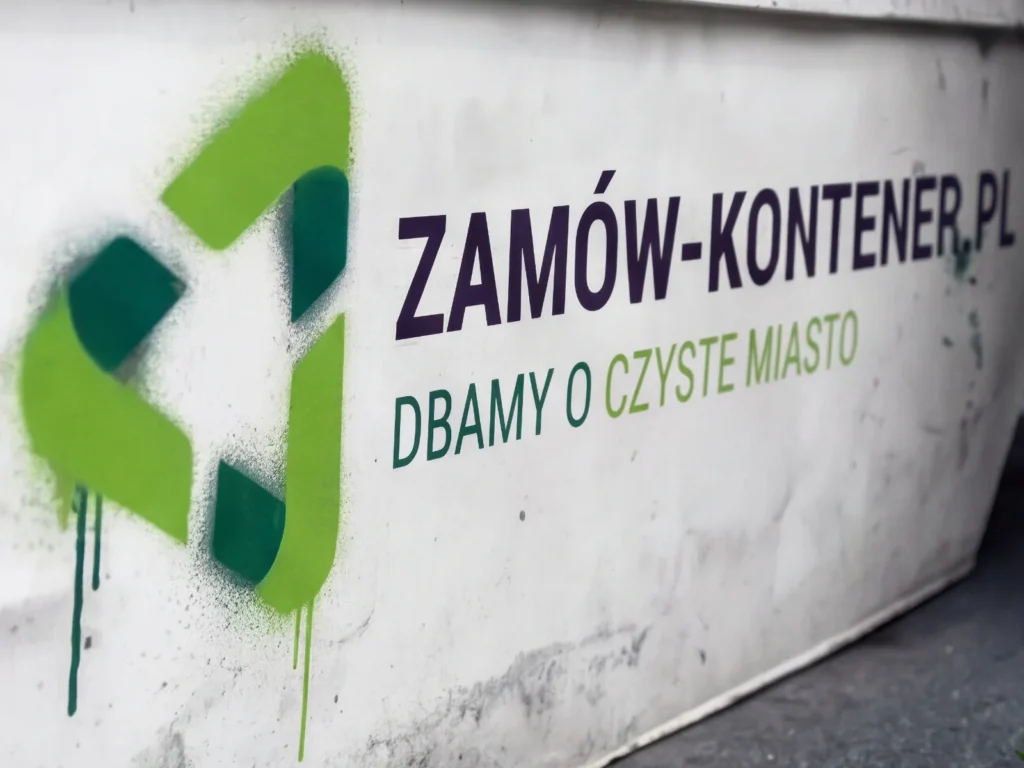 Graffiti-style wall ad in Polish: 'ZAMÓW-KONTENER.PL' and 'DBAMY O CZYSTE MIASTO' with lime-green geometric shapes and paint drips on a white surface.